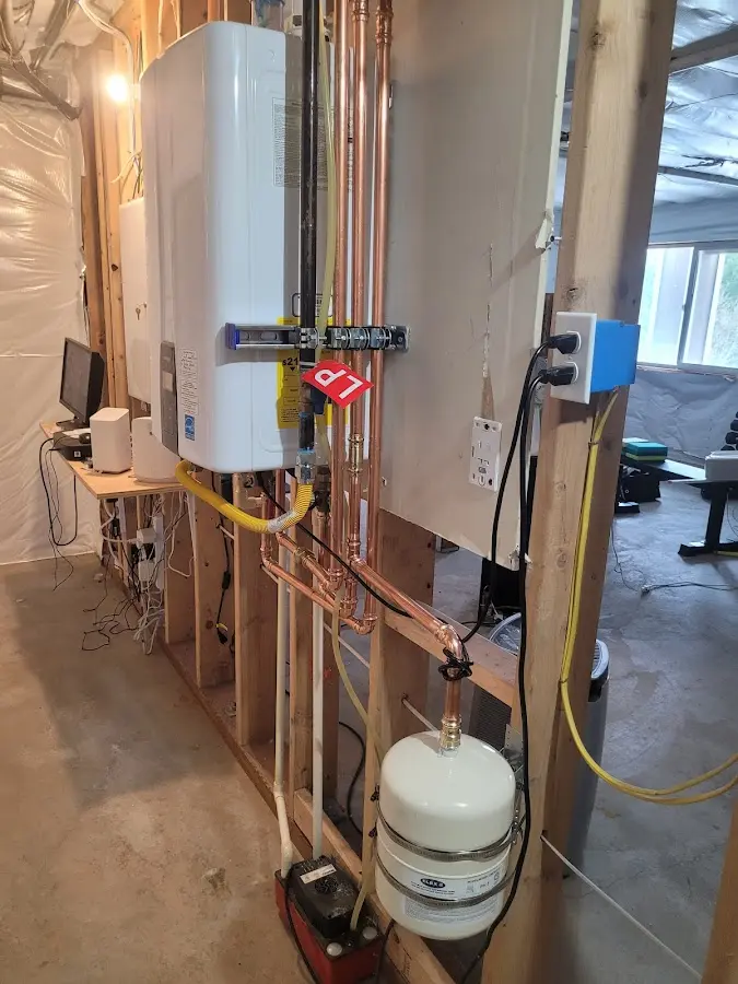 Licensed plumber repairing a kitchen sink in Mountain View